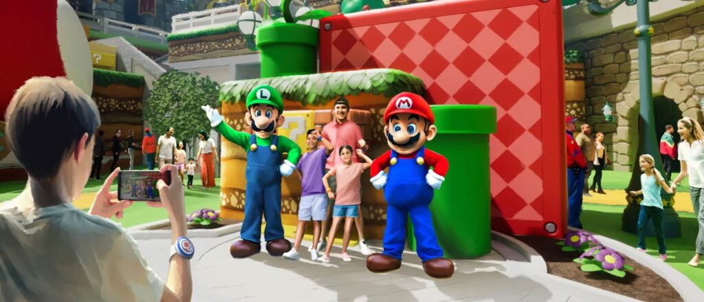 Imagem ilustrativa mostra pessoas se encontrando com Mario e Luigi do clássico jogo de vídeo game Super Mario. Visitantes se posicionam para fotos com os personagens em frente a um cenário com canos e colorido como no jogo