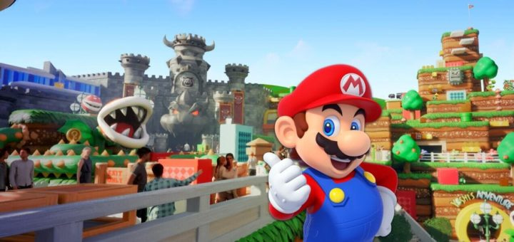Mario em frente ao cenário de sua nova area Super Nintendo World no novo parque da universal orlando epic universe que vai inaugurar em 2025 na florida. O cenário mostra o Castelo do Bowser e toda a terra pela qual Mario se aventura no game