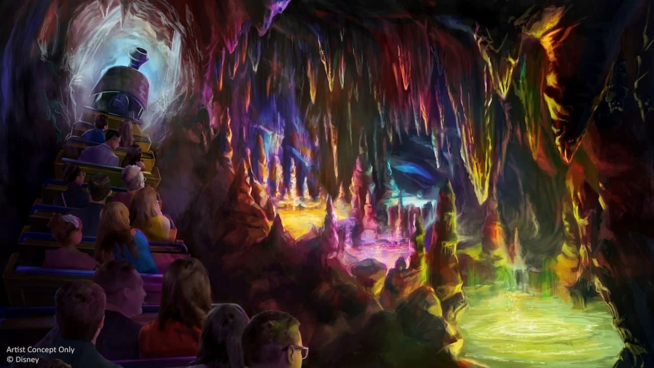 Arte conceitual de como ficará a atração Big Thunder Mountain Railroad, montanha russa do Magic Kingdom na Disney World em Orlando, que mostra o carrinho de trem passando cheio de pessoas pela gruta da montanha