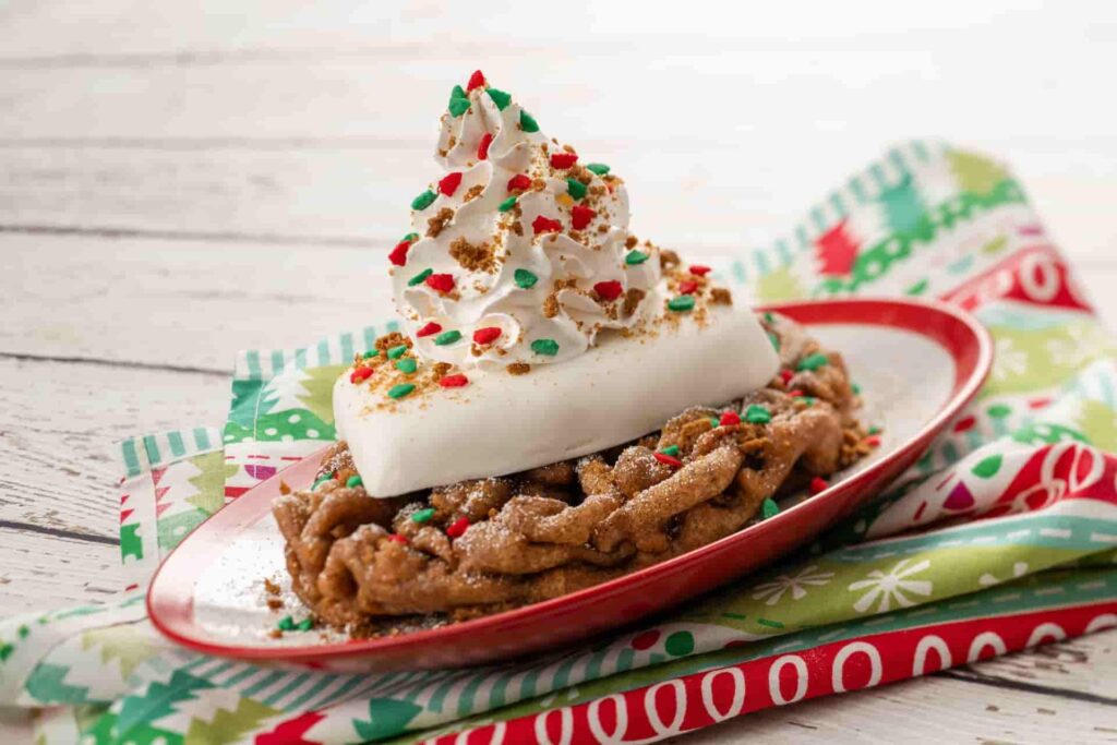 Funnel Cake festivo servido no Festival of Holidays que acontece no Epcot, parque de diversões da Disney, durante as festas de final de ano