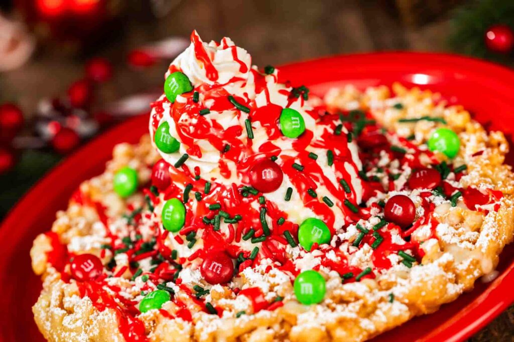A festa de natal anual do Magic Kingdom na Disney, a Mickey's Very Merry Christmas party que acontece no Magic Kingdom conta com gastronomia exclusiva como funnel cake natalino