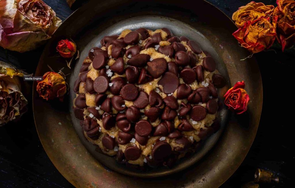 imagem artística promocional de cookie do Gideon's Bakehouse, o mais famoso de todas Disney Springs