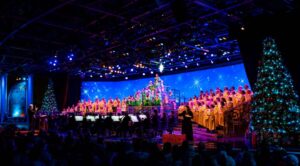 Candlelight processional é um evento de natal que acontece no Epcot anualmente e reúne celebridades que narram o show