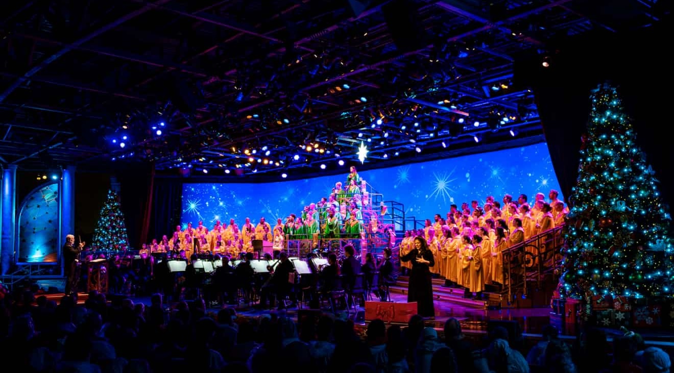 Candlelight processional é um evento de natal que acontece no Epcot anualmente e reúne celebridades que narram o show